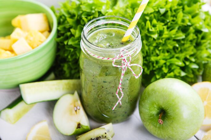 Hearty lunch detox smoothie with banana, apple, spinach, nuts and flaxseed